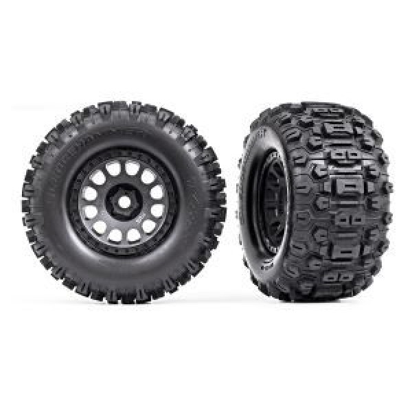 Traxxas Tires & wheels, assembled, glued (XRT Race black wheels, Sledgehammer tires, foam inserts) (left & right)